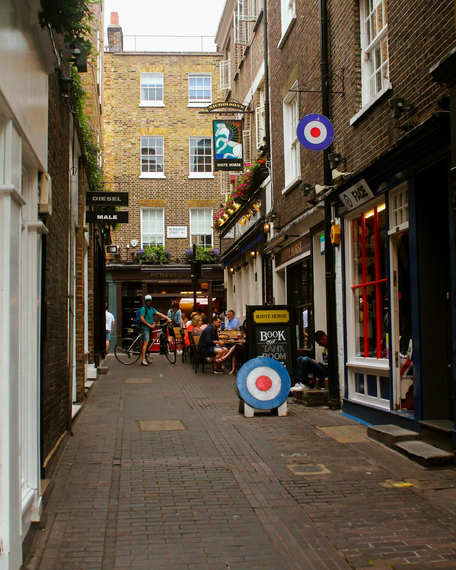 A British high street lined with independent shops and cafés